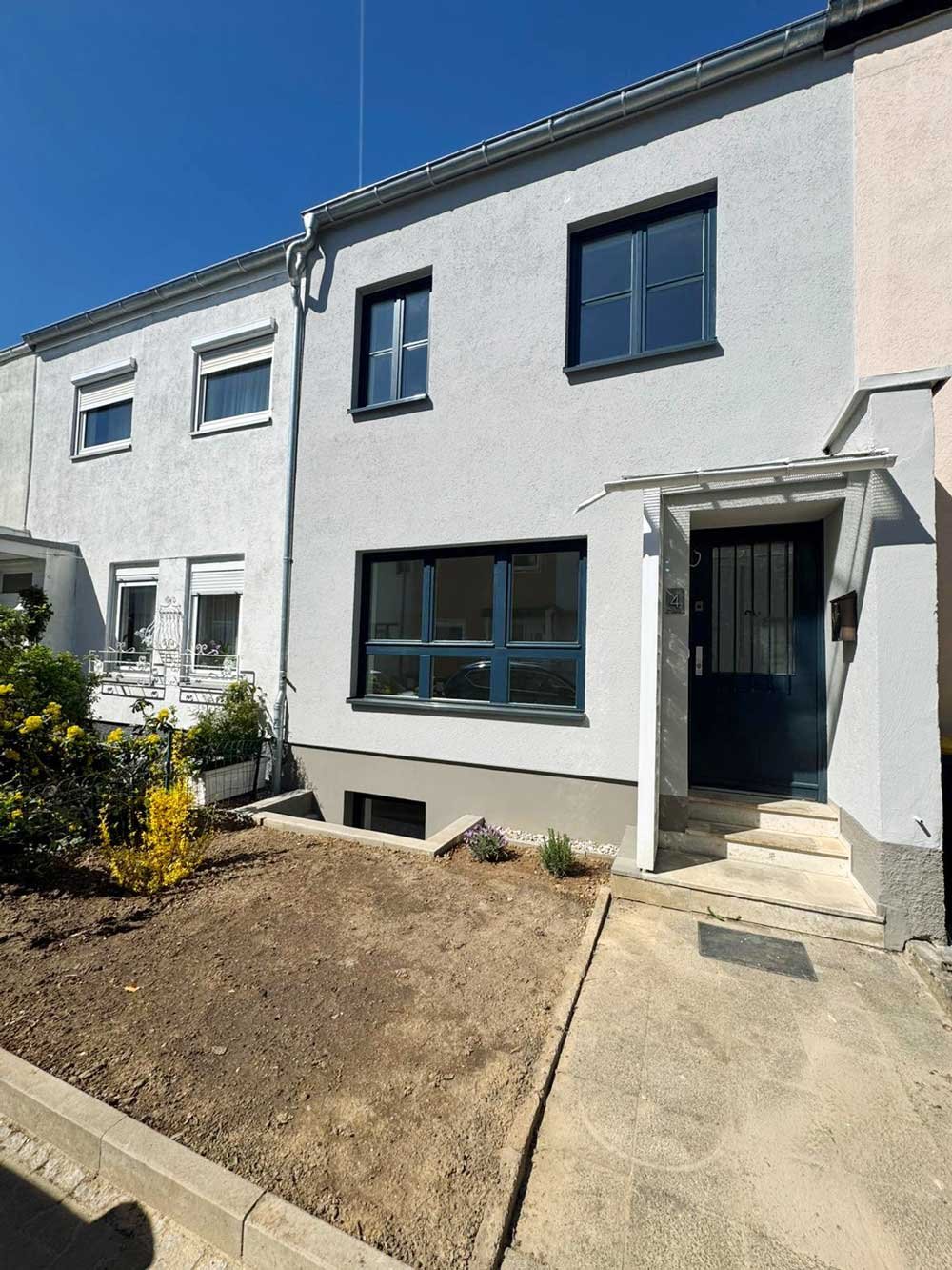 *** Erstbezug nach Sanierung *** Stilvolles Ernst-May-Haus mit Garten